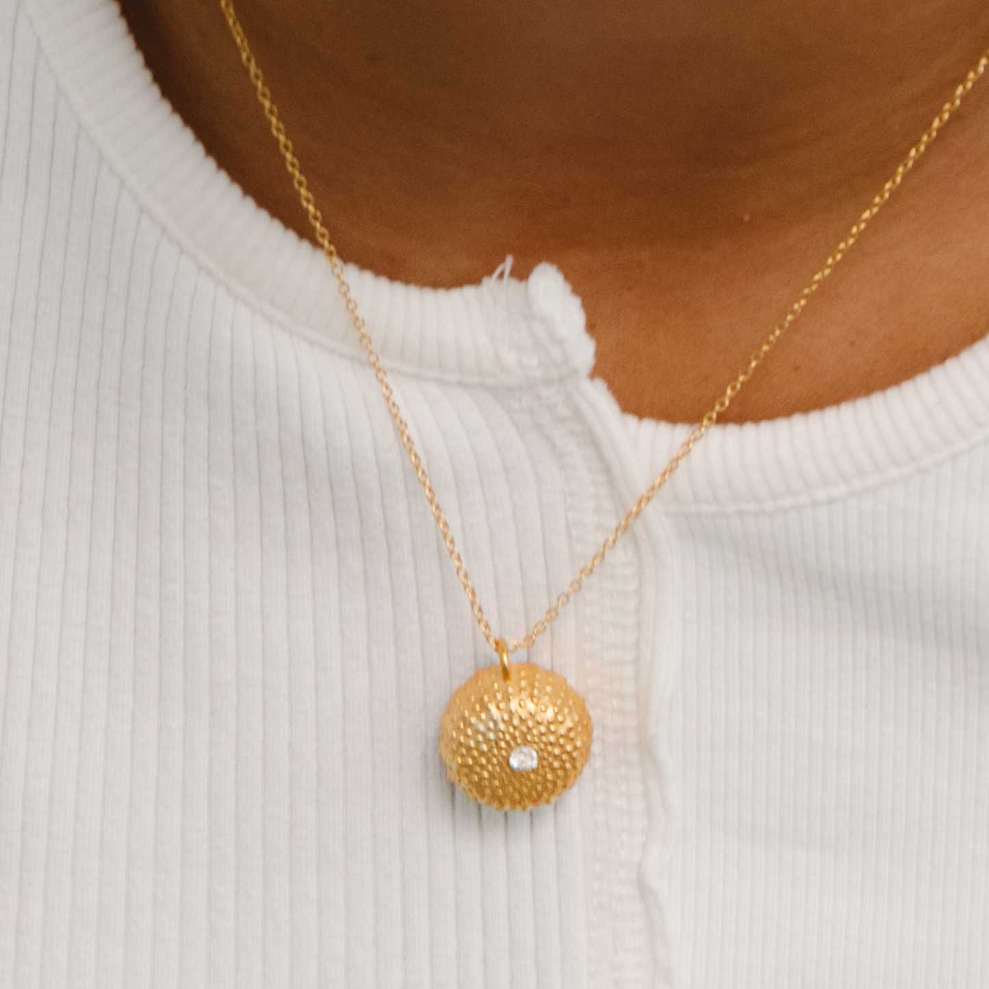 Model wearing Sea Urchin gold bracelet