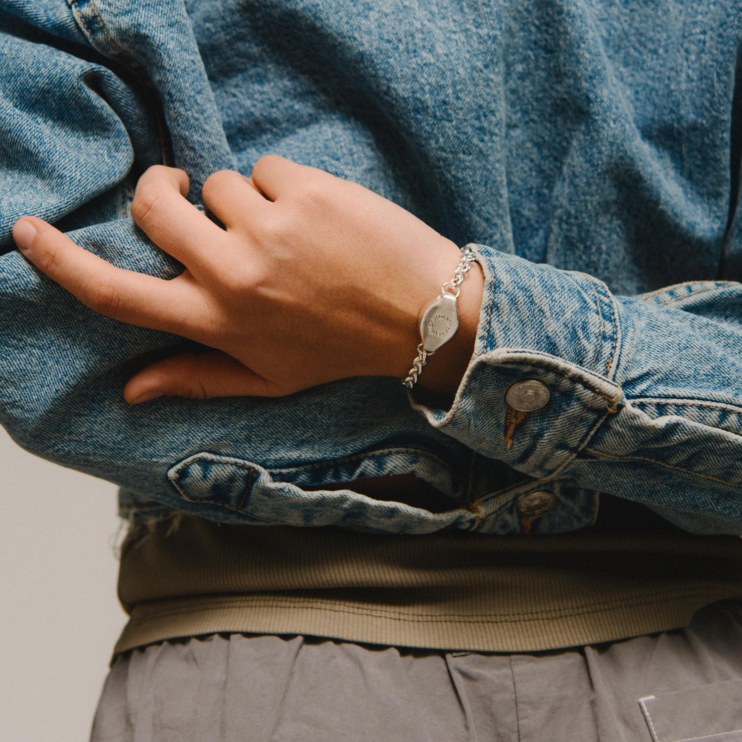 Signet bracelet worn by model