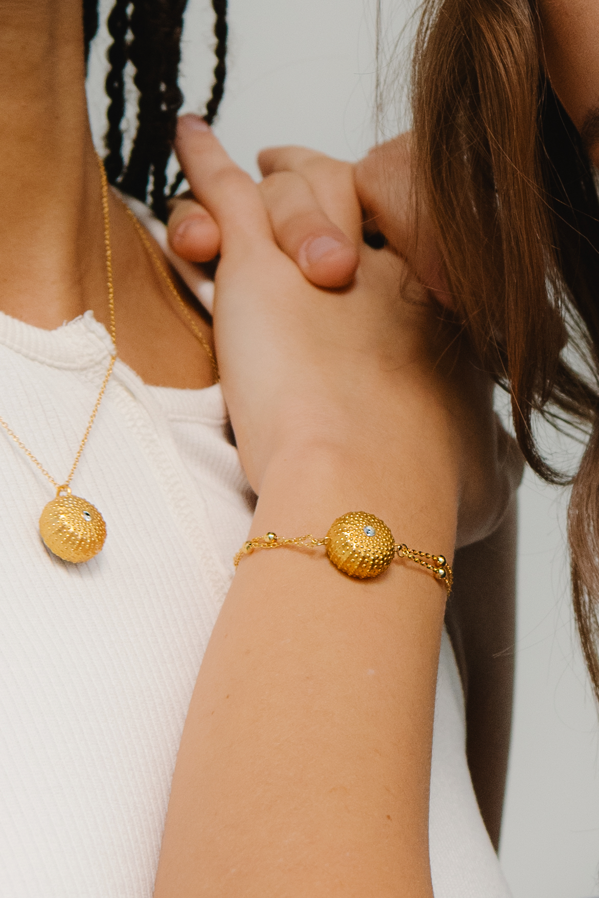 Sea urchin bracelet worn by model